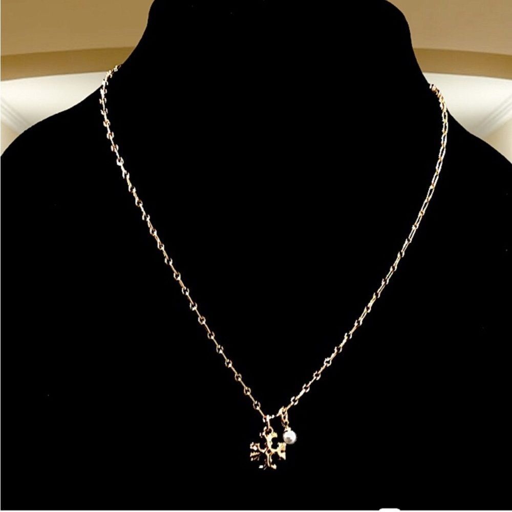 Elegant Gold Necklace with Charm